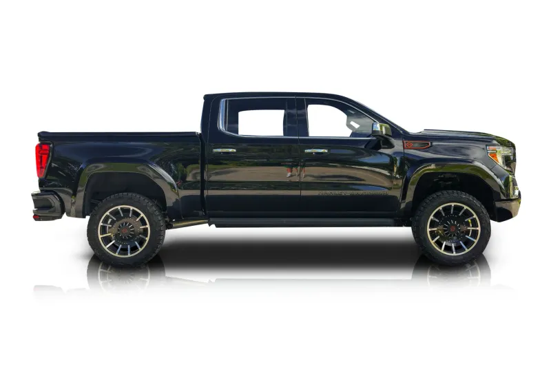 An incredible side shot photo of aGMC Sierra 1500 that you should buy.