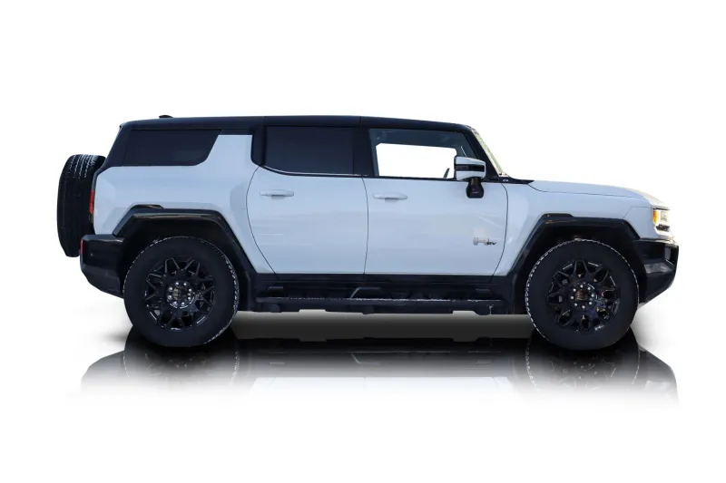 An incredible side shot photo of aGMC Hummer EV that you should buy.