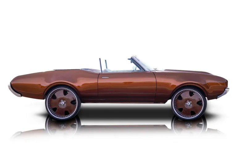 An incredible side shot photo of aOldsmobile Cutlass that you should buy.