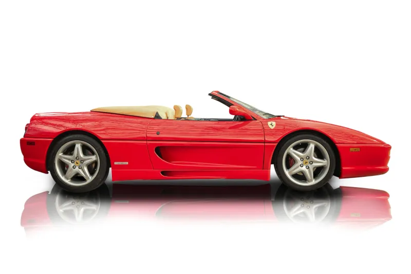 An incredible side shot photo of aFerrari F355 Spider that you should buy.