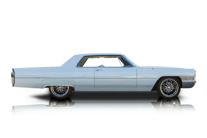 An incredible side shot photo of aCadillac DeVille that you should buy.