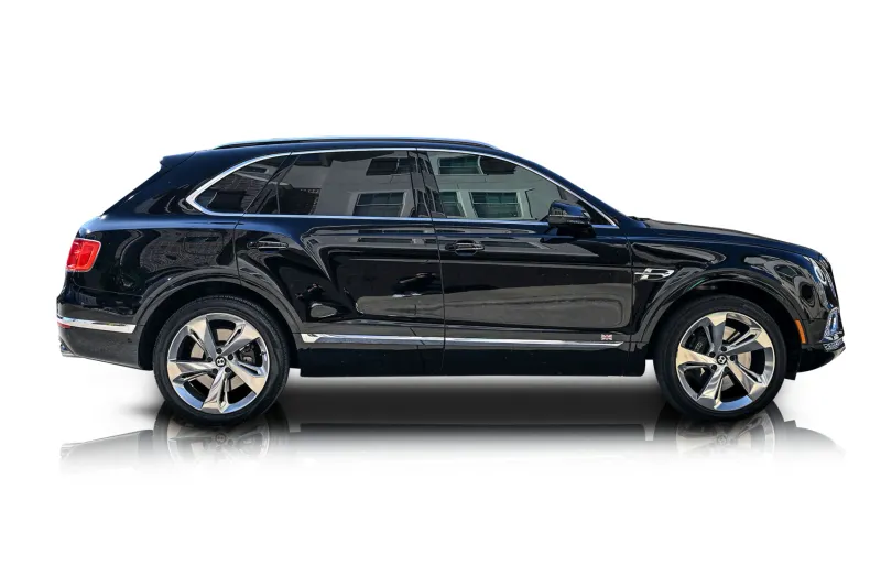 An incredible side shot photo of aBentley Bentayga that you should buy.