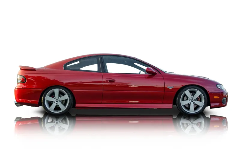 An incredible side shot photo of aPontiac GTO that you should buy.