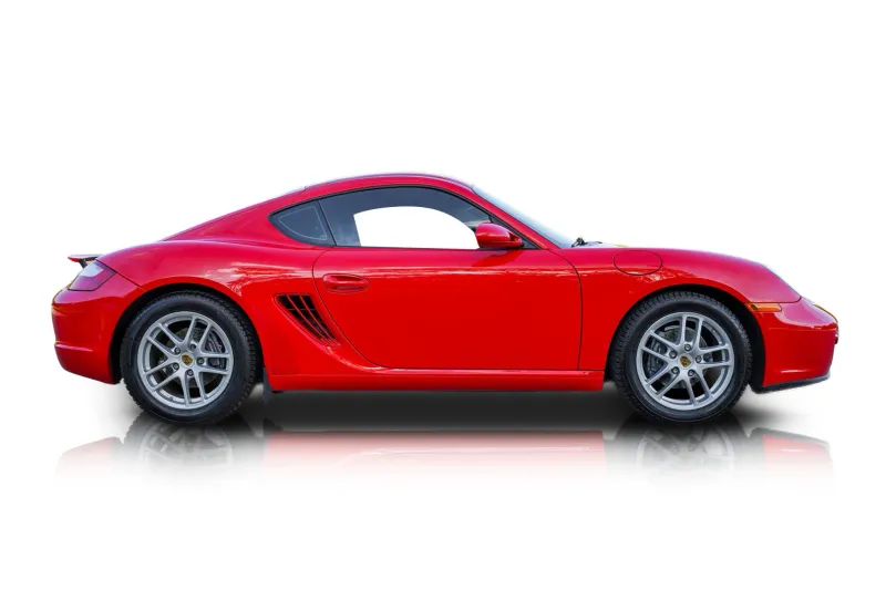 An incredible side shot photo of aPorsche Cayman that you should buy.