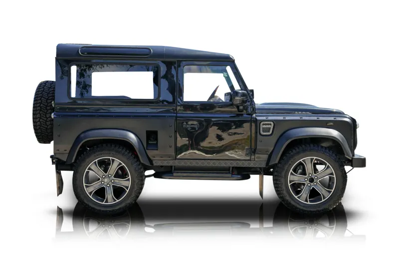 An incredible side shot photo of aLand Rover Defender 90 that you should buy.