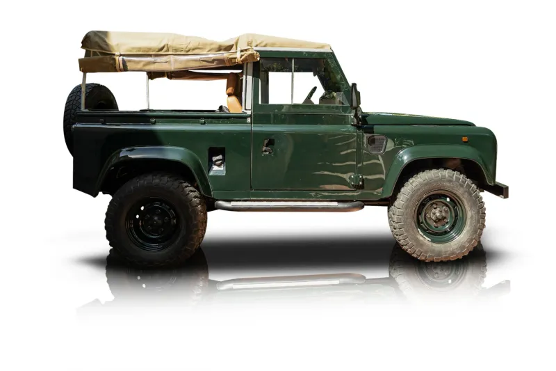 An incredible side shot photo of aLand Rover Defender 90 that you should buy.