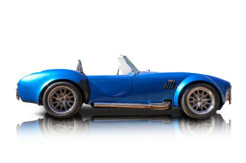 An incredible side shot photo of aShelby Cobra that you should buy.