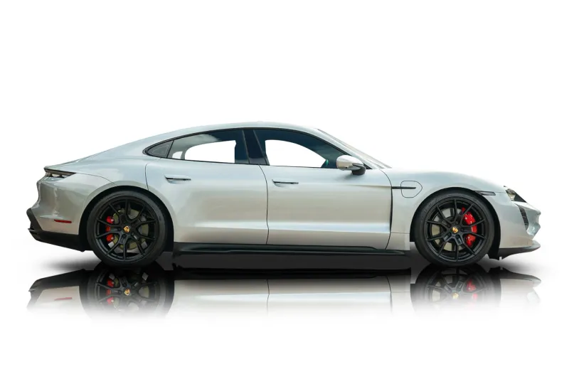 An incredible side shot photo of aPorsche Taycan that you should buy.