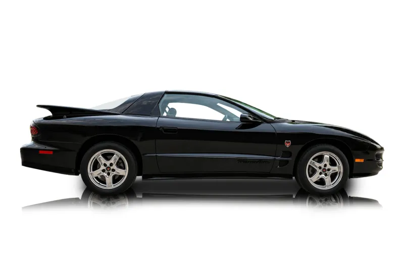 An incredible side shot photo of aPontiac Firebird that you should buy.
