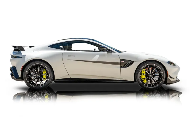 An incredible side shot photo of aAston Martin Vantage that you should buy.