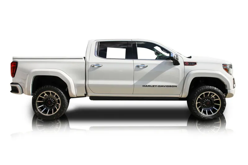 An incredible side shot photo of aGMC Sierra 1500 that you should buy.
