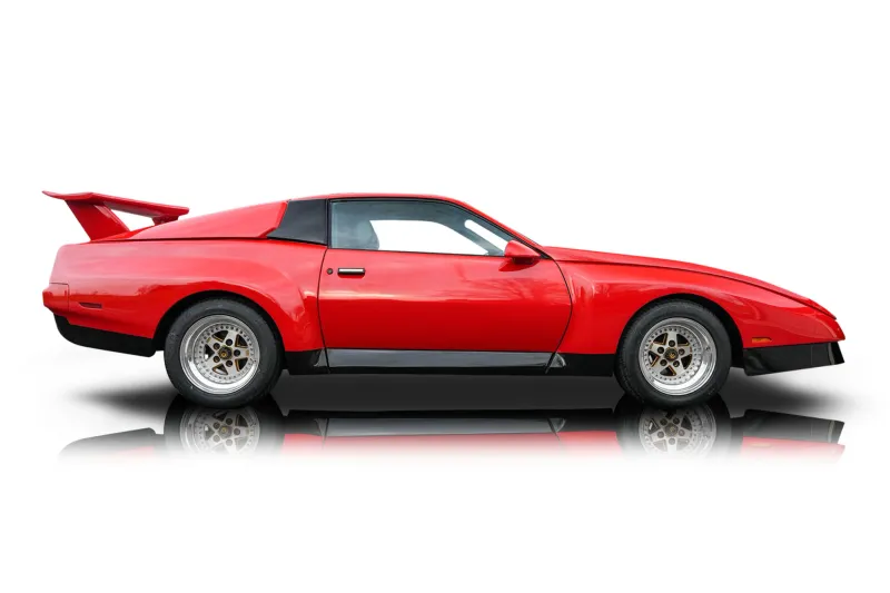 An incredible side shot photo of aPontiac Firebird that you should buy.