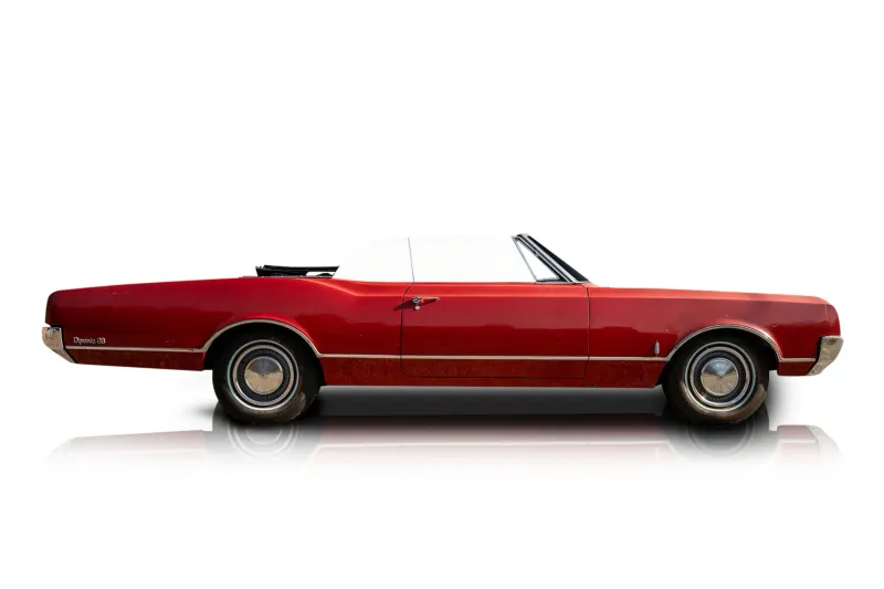 An incredible side shot photo of aOldsmobile Dynamic 88 that you should buy.
