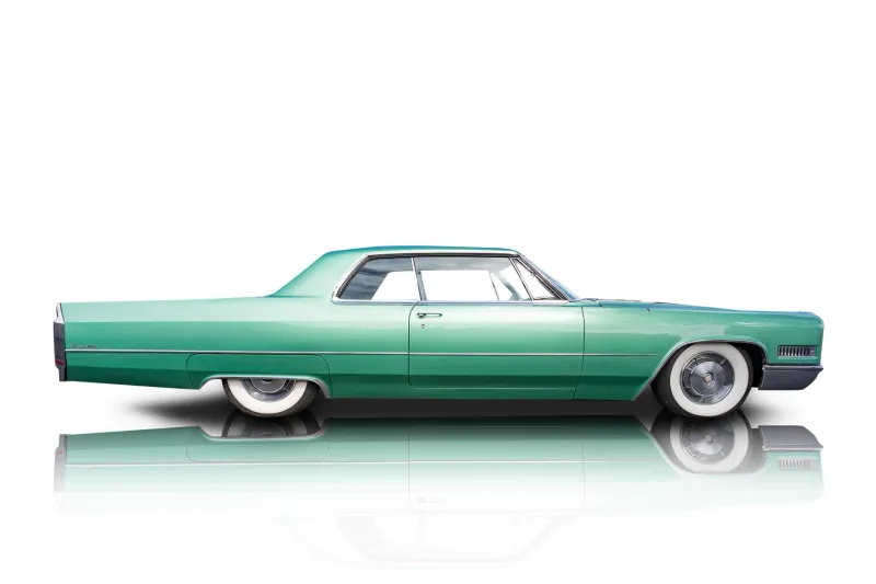 An incredible side shot photo of aCadillac DeVille that you should buy.