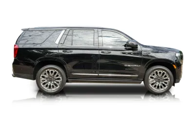 Passenger side photo of 2024 GMC Yukon