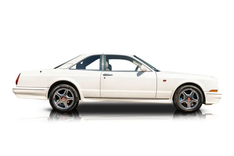An incredible side shot photo of aBentley Continental that you should buy.