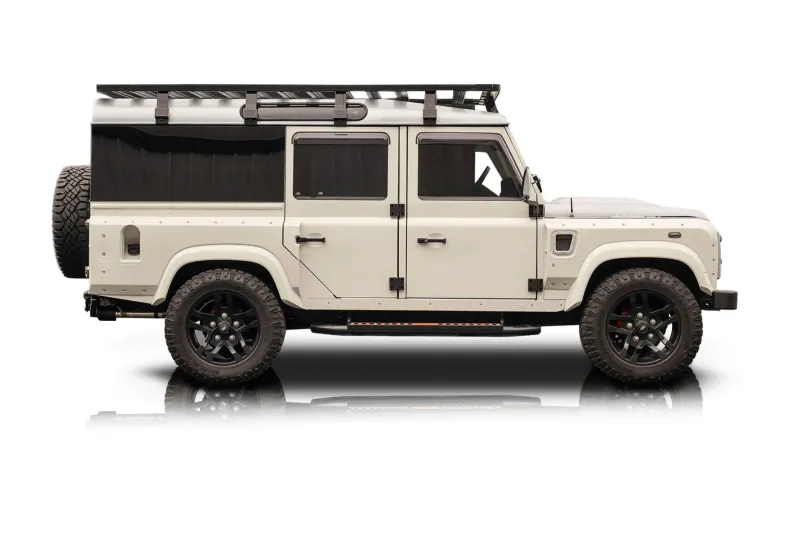 An incredible side shot photo of aLand Rover Defender 110 that you should buy.