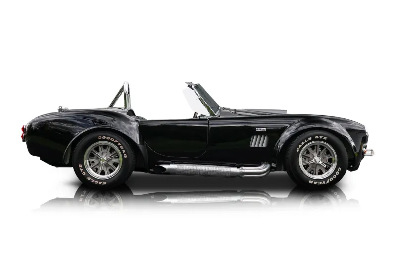 An incredible side shot photo of aShelby Cobra that you should buy.