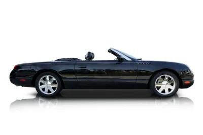 Passenger side photo of 2002 Ford Thunderbird