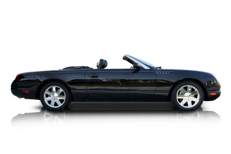 An incredible side shot photo of aFord Thunderbird that you should buy.