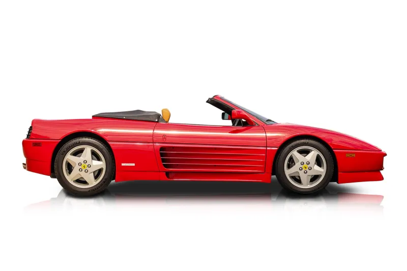 An incredible side shot photo of aFerrari 348 that you should buy.