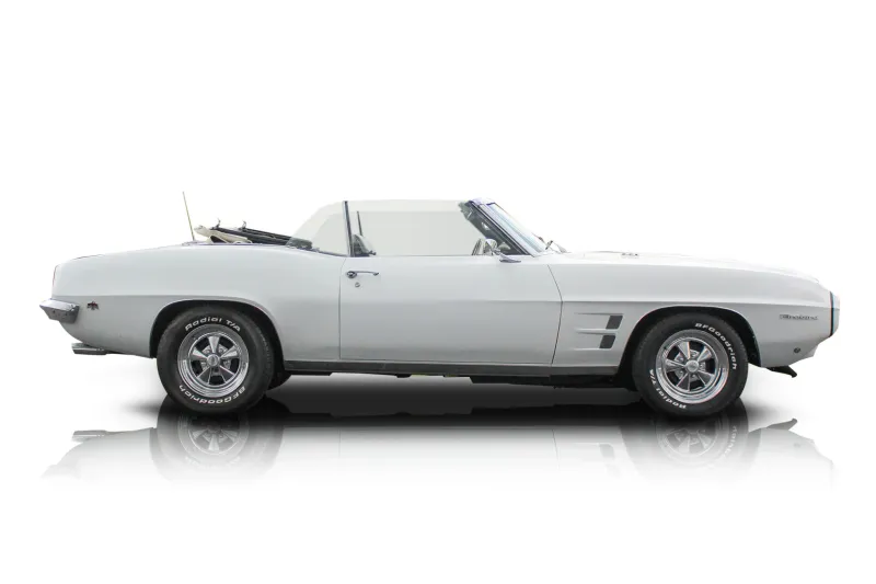 An incredible side shot photo of aPontiac Firebird that you should buy.