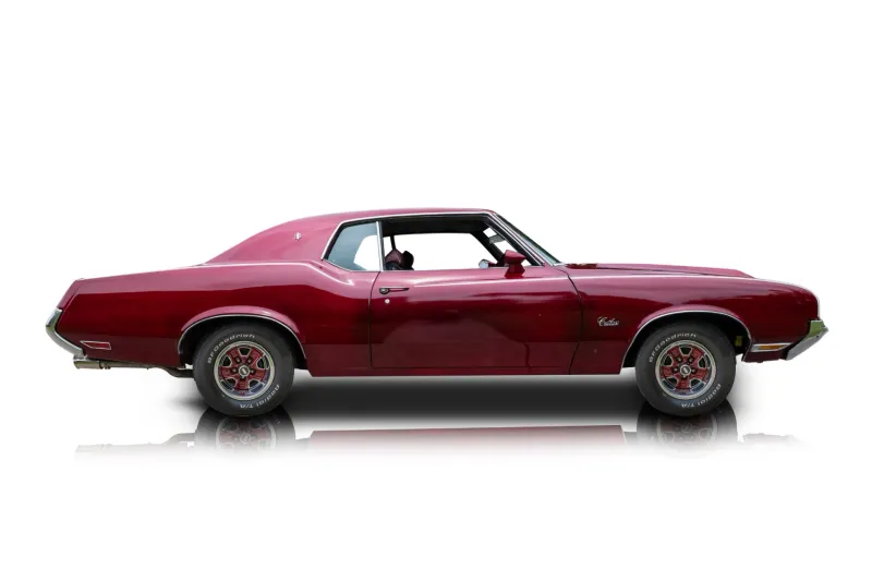 An incredible side shot photo of aOldsmobile Cutlass that you should buy.