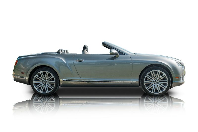 An incredible side shot photo of aBentley Continental that you should buy.