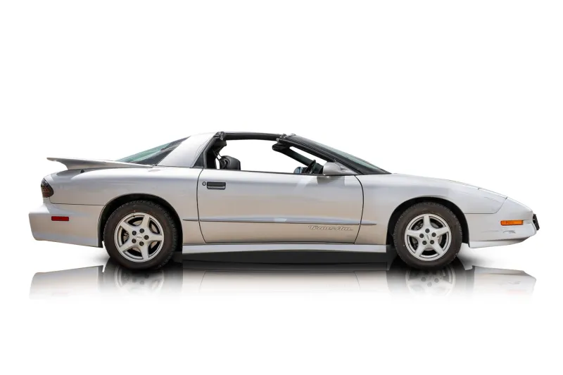 An incredible side shot photo of aPontiac Firebird that you should buy.