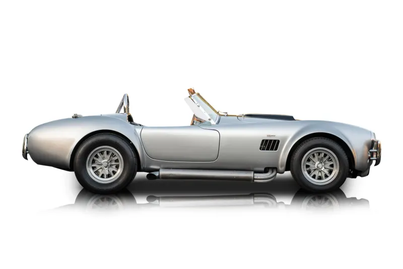 An incredible side shot photo of aShelby Cobra that you should buy.
