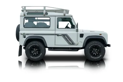 Passenger side photo of 1999 Land Rover Defender 90