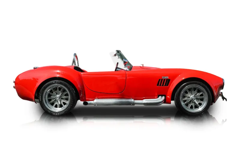 An incredible side shot photo of aShelby Cobra that you should buy.