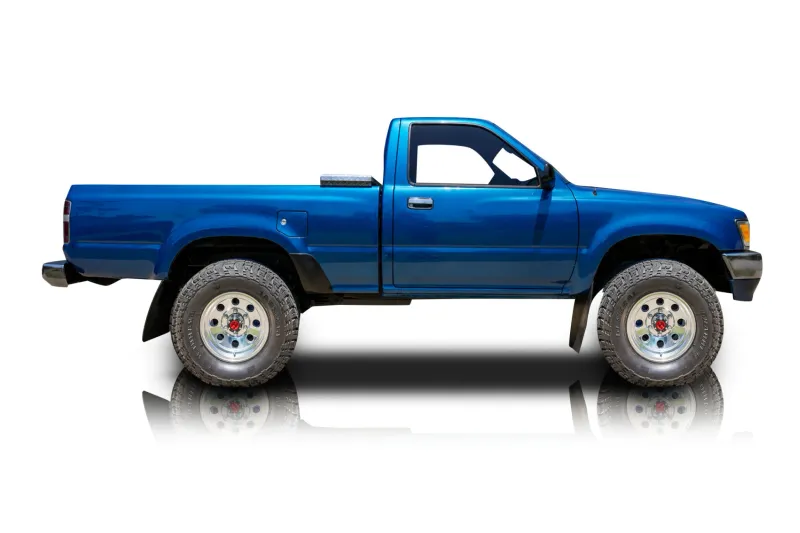 An incredible side shot photo of aToyota Pickup that you should buy.