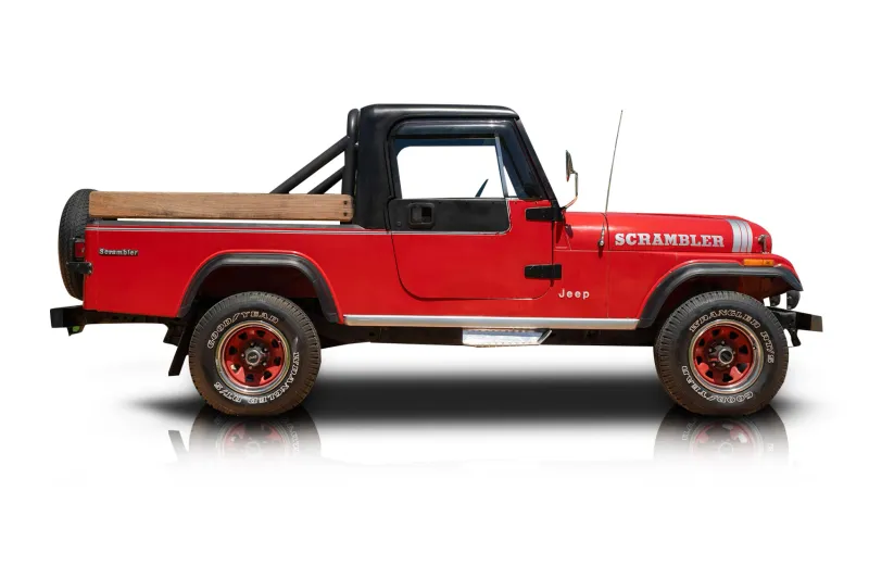 An incredible side shot photo of aJeep CJ-8 Scrambler that you should buy.
