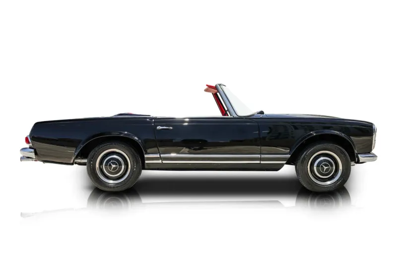 An incredible side shot photo of aMercedes-Benz 230SL that you should buy.
