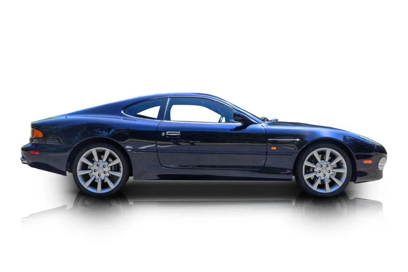 An incredible side shot photo of aAston Martin DB7 that you should buy.