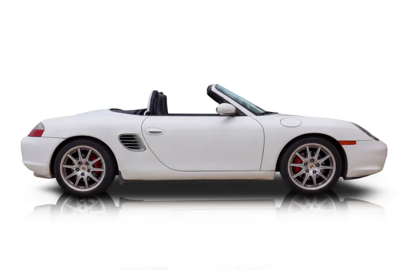 An incredible side shot photo of aPorsche Boxster that you should buy.