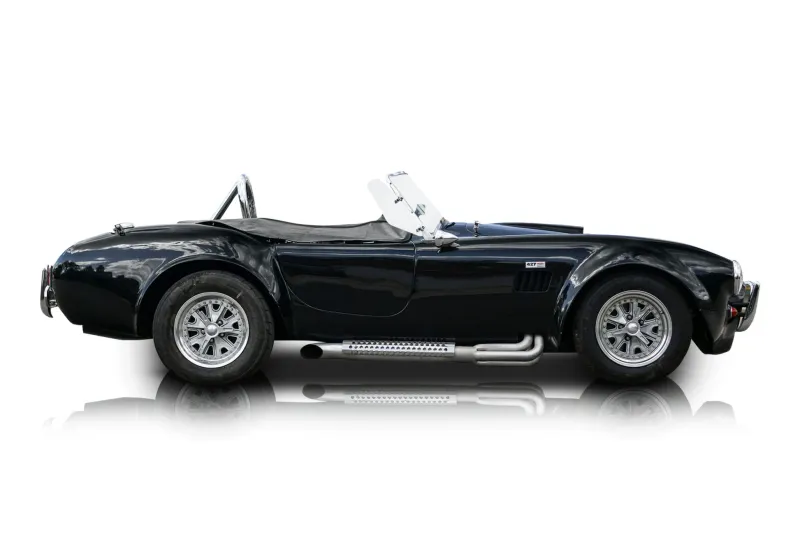 An incredible side shot photo of aShelby Cobra that you should buy.