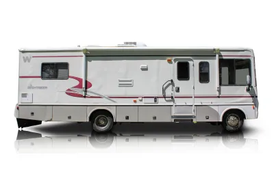 Passenger side photo of 2002 Winnebago Sightseer