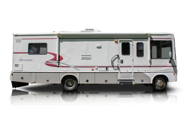 An incredible side shot photo of aWinnebago Sightseer that you should buy.