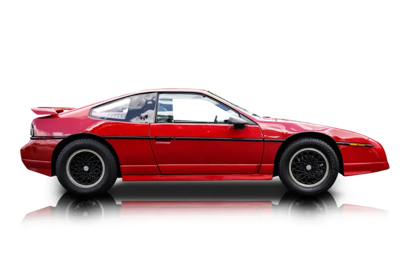 An incredible side shot photo of aPontiac Fiero that you should buy.