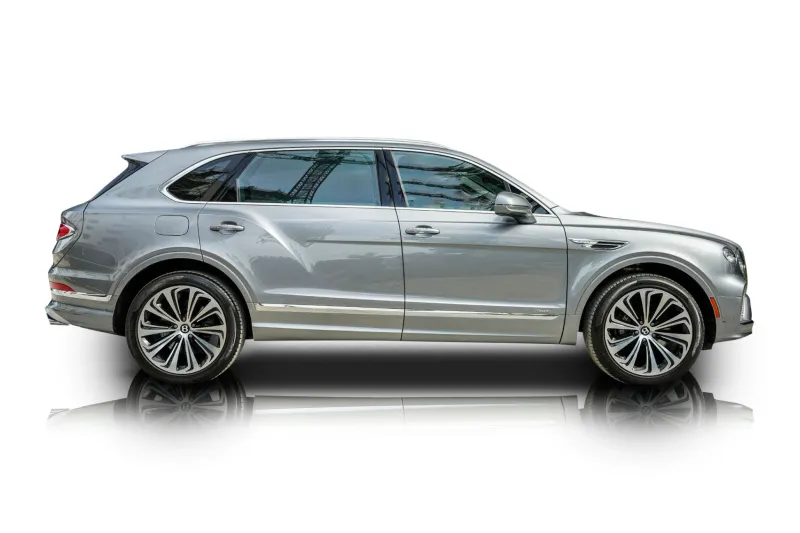 An incredible side shot photo of aBentley Bentayga that you should buy.