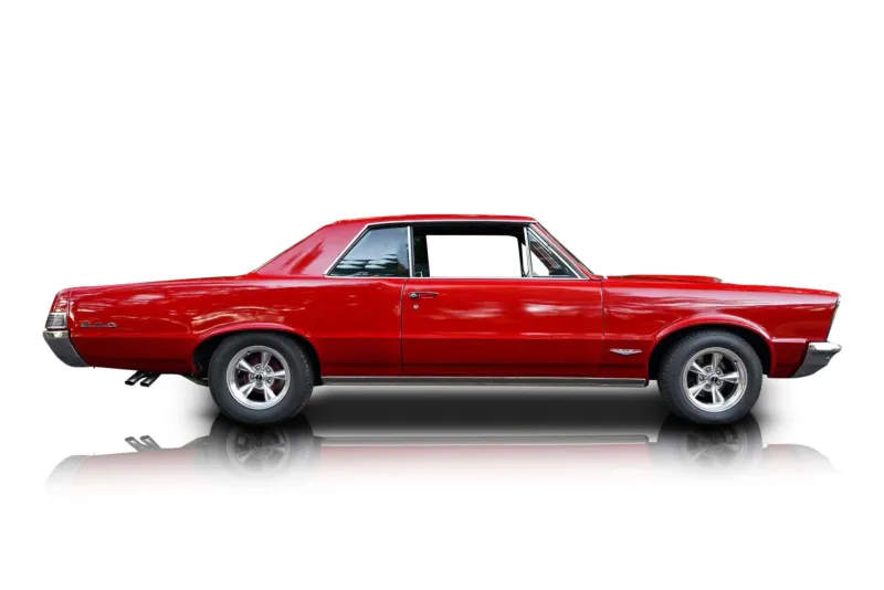 An incredible side shot photo of aPontiac GTO that you should buy.