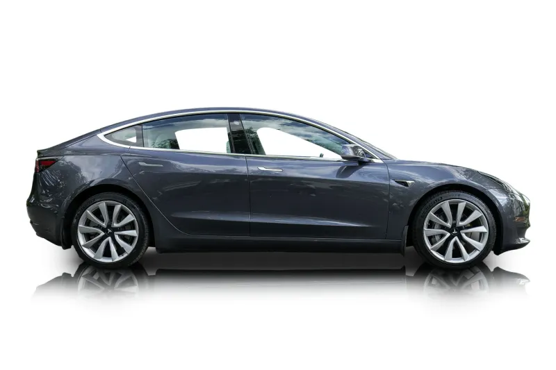 An incredible side shot photo of aTesla Model 3 that you should buy.