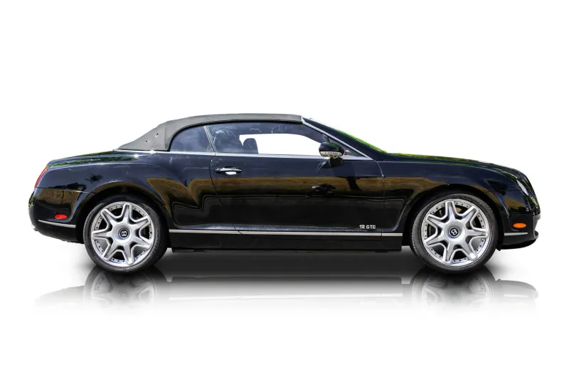 An incredible side shot photo of aBentley Continental that you should buy.