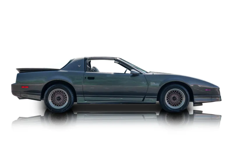 An incredible side shot photo of aPontiac Firebird that you should buy.