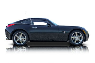 Passenger side photo of 2009 Pontiac Solstice