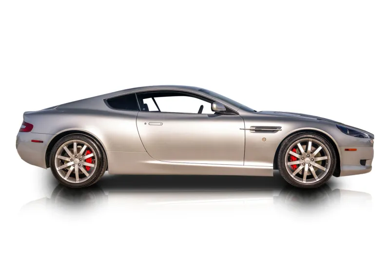 An incredible side shot photo of aAston Martin DB9 that you should buy.