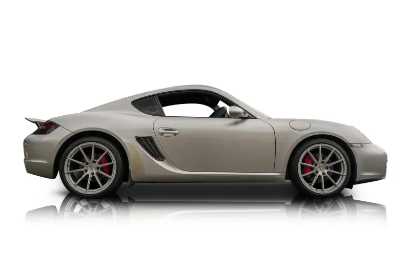 An incredible side shot photo of aPorsche Cayman that you should buy.