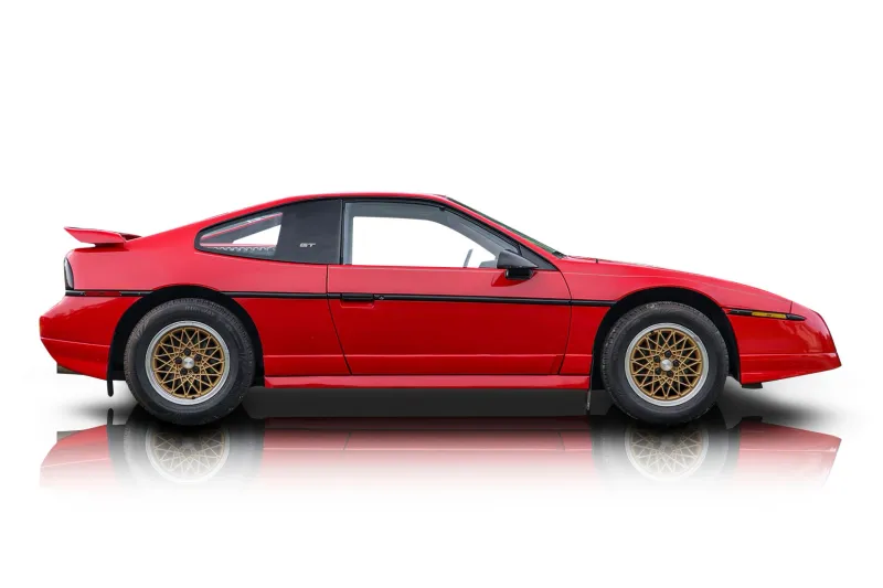 An incredible side shot photo of aPontiac Fiero that you should buy.